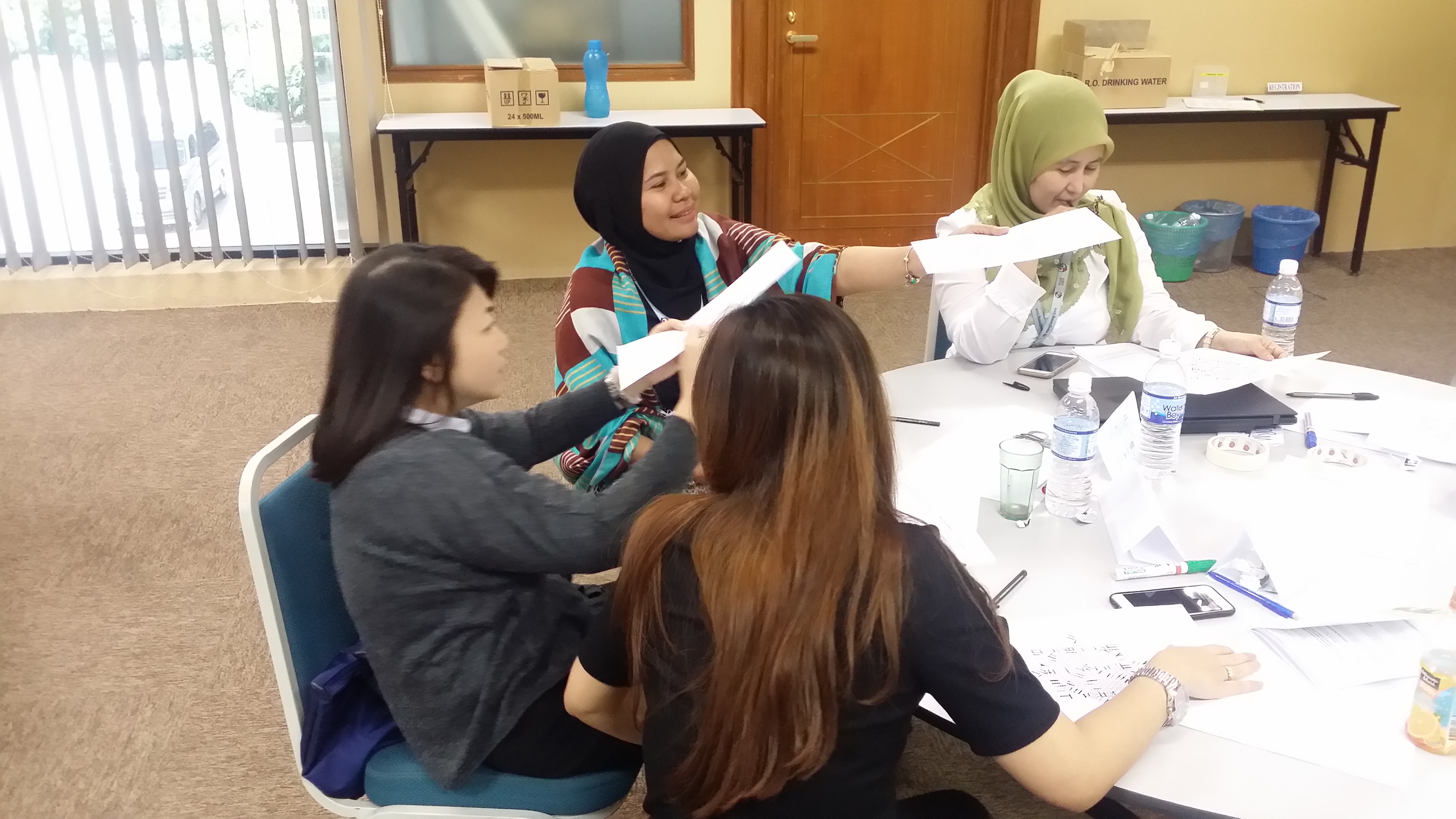 Training participants engaged in workshop activity